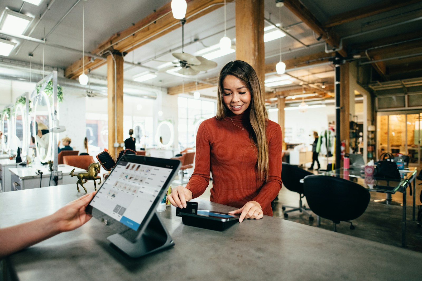 turned-on monitor showing satisfied customer